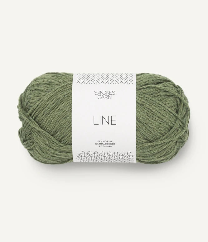 A ball of olive coloured cotton/linen/viscose yarn labeled 'Line' by Sandnesgarn