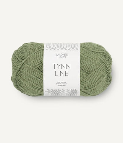 A ball of olive cotton/linen/viscose yarn labeled 'TYNN LINE' by Sandnes Garn