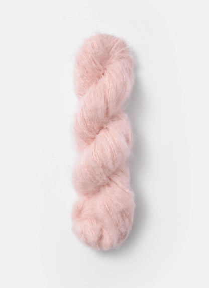 A light-pink skein of brushed suri, merino, and bamboo yarn from Bluesky Fibers