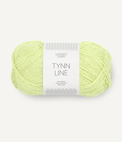 A ball of bright lime cotton/linen/viscose yarn labeled 'TYNN LINE' by Sandnes Garn