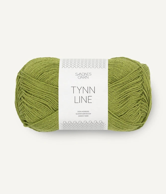 A ball of matcha cotton/linen/viscose yarn labeled 'TYNN LINE' by Sandnes Garn