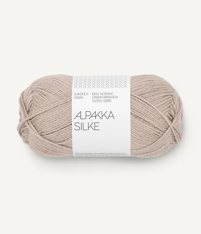 A cream ball of alpaca and silk yarn from Sandnes Garn