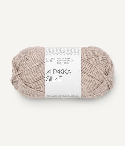 A cream ball of alpaca and silk yarn from Sandnes Garn