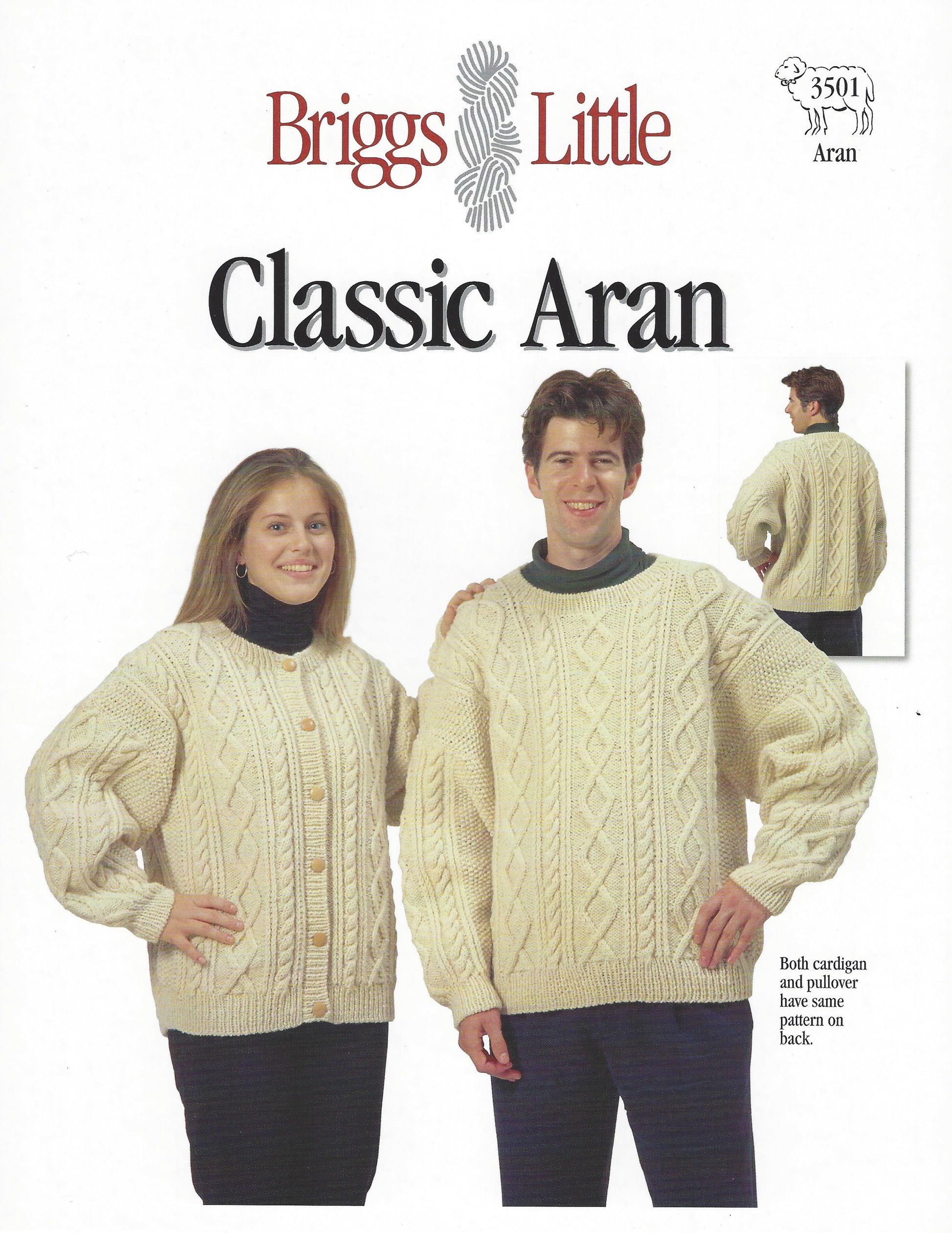 A man and a woman standing and modeling a beige Briggs & Little classic aran sweater with a crew neckline and long sleeves.