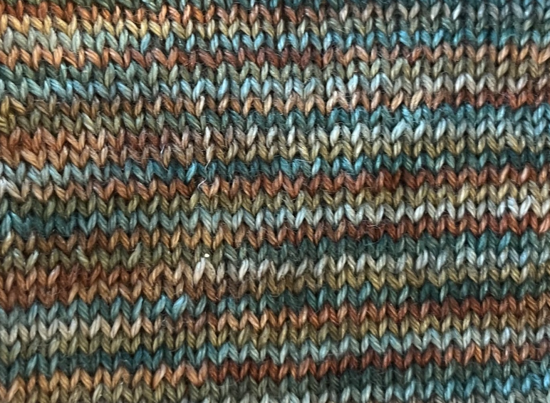 Close up knitted swatch of Copper Hill yarn