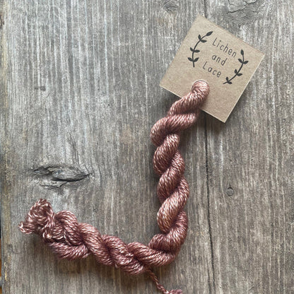 A skein of Nutmeg brown embroidery yarn labelled 'Lichen and Lace'.