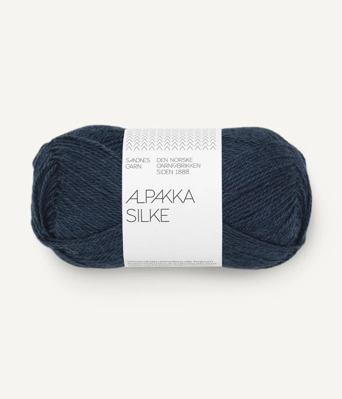 A navy ball of alpaca and silk yarn from Sandnes Garn