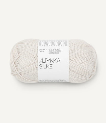 A white-grey ball of alpaca and silk yarn from Sandnes Garn
