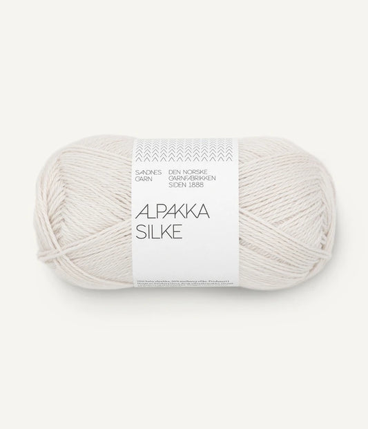 A white-grey ball of alpaca and silk yarn from Sandnes Garn