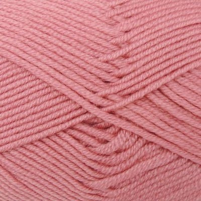 A skein of Estelle Superwash Merino DK  wool yarn in Dusty Rose colour.