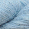 Close-up image of a skein of frost blue colored baby llama yarn.