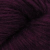 Close-up image of a skein of eggplant purple colored baby llama yarn.