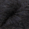 Close-up image of a skein of steel grey colored baby llama yarn.