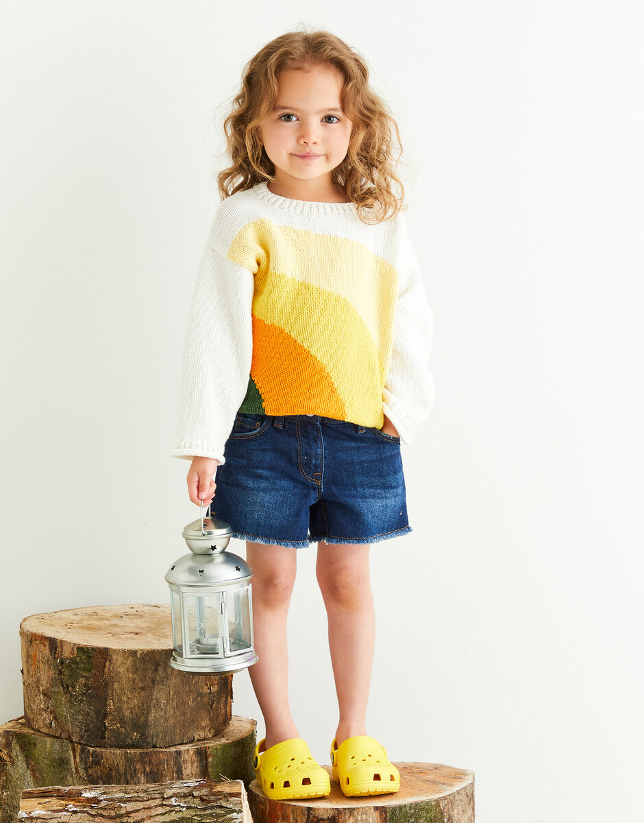 Pattern for Child wearing a colorful sweater 