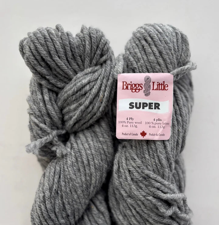 Gray wool yarn skeins with a Briggs & Little label 