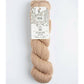 Beige skein of yarn with a label on a white background