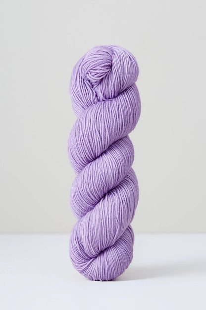 A skein of pale purple superwash merino wool from Urth 