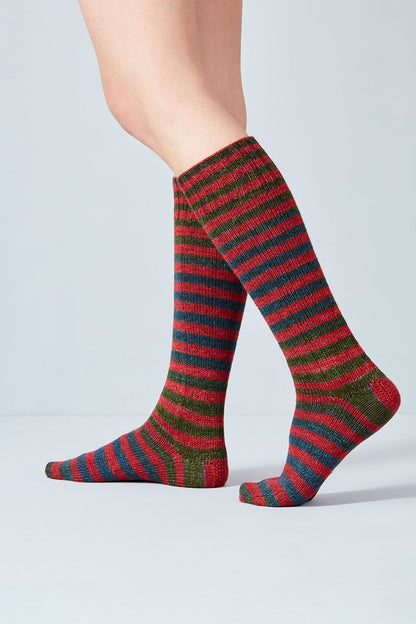 Merino and nylon knit red, green, and navy stripe socks from Urth