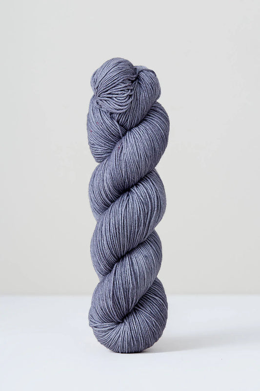 A skein of purple/grey superwash merino wool from Urth 