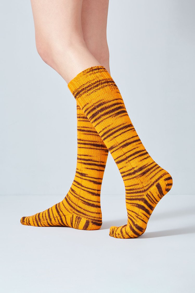 Merino and nylon knit yellow and black stripe socks from Urth