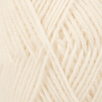 Close up of off white wool yarn from Drops