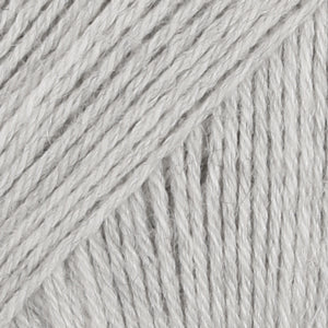 Close-up of pale grey wool/polyamide/ alpaca yarn from Drops