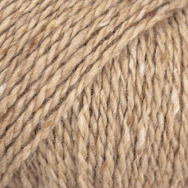 Close-up of tan wool/alpaca/viscose yarn from Drops