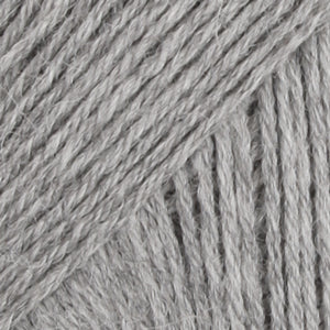 Close-up of light grey wool/polyamide/ alpaca yarn from Drops