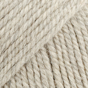 Close-up of light grey wool and alpaca yarn from Drops