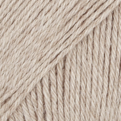 Close-up of beige wool/polyamide/ alpaca yarn from Drops