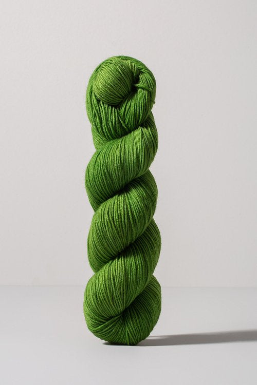 green skein of merino and nylon yarn from Urth