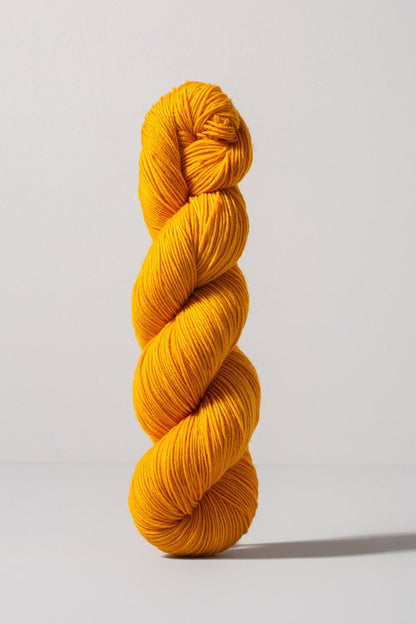 Golden yellow skein of merino and nylon yarn from Urth