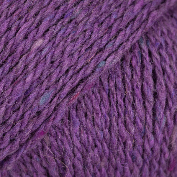 Close-up of magenta wool/alpaca/viscose yarn from Drops