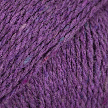 Close-up of magenta wool/alpaca/viscose yarn from Drops