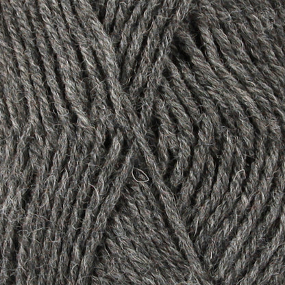 Close up of grey tonal wool yarn from Drops