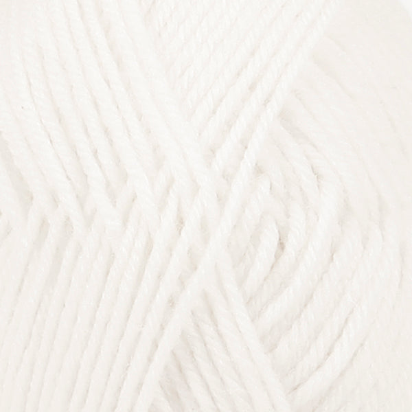 Close up of white wool yarn from Drops