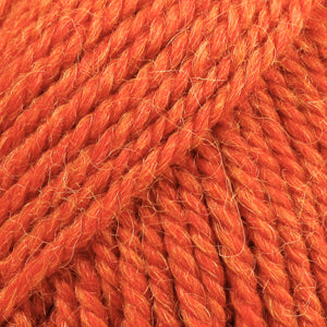 Close-up of orange wool and alpaca yarn from Drops