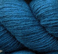 A close up of teal cashmere yarn from Nordic