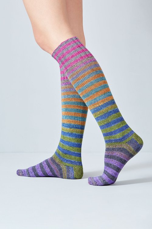 Merino and nylon knit purple, blue, green, orange, and pink stripe socks from Urth