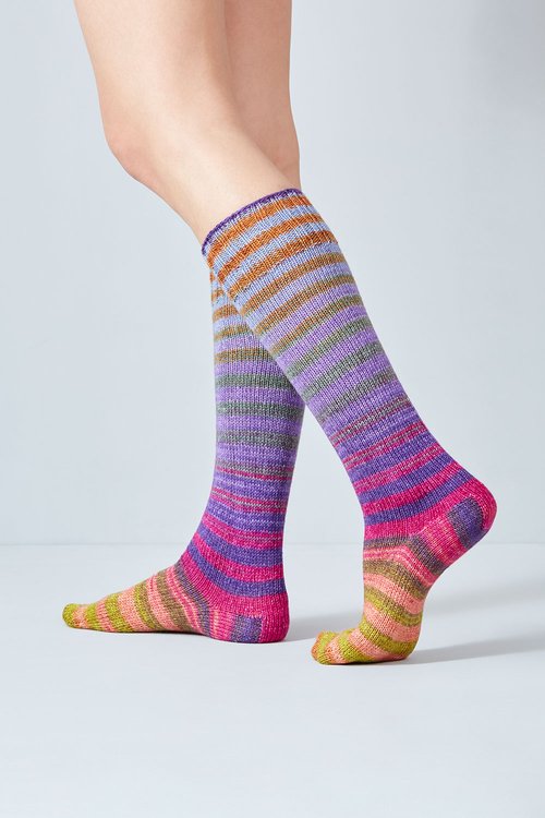 Merino and nylon knit pink, yellow, purple, and orange stripe socks from Urth