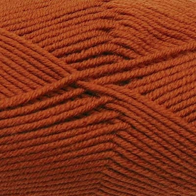 A skein of Estelle Superwash Merino DK wool yarn in Amber colour.