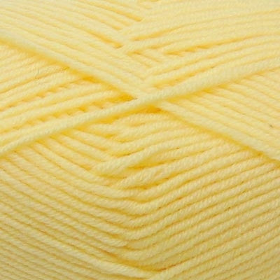 A skein of Estelle Superwash Merino DK wool yarn in Butter yellow colour. 