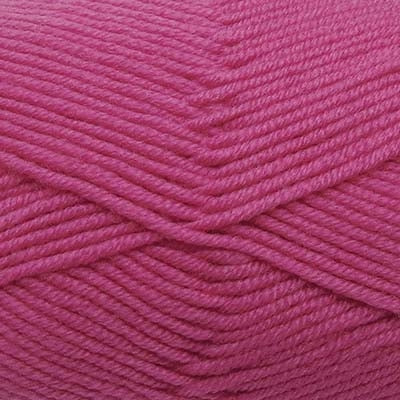 A skein of Estelle Superwash Merino DK  wool yarn in Lily pink colour.