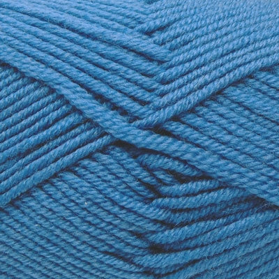 A skein of Estelle Superwash Merino DK  wool yarn in Blueberry blue colour.