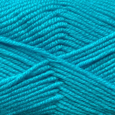 A skein of Estelle Superwash Merino DK  wool yarn in Turquoise blue colour.