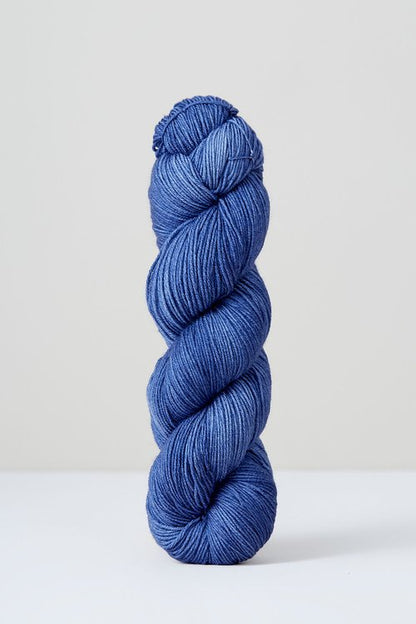 A skein of pale blue/purple superwash merino wool from Urth 
