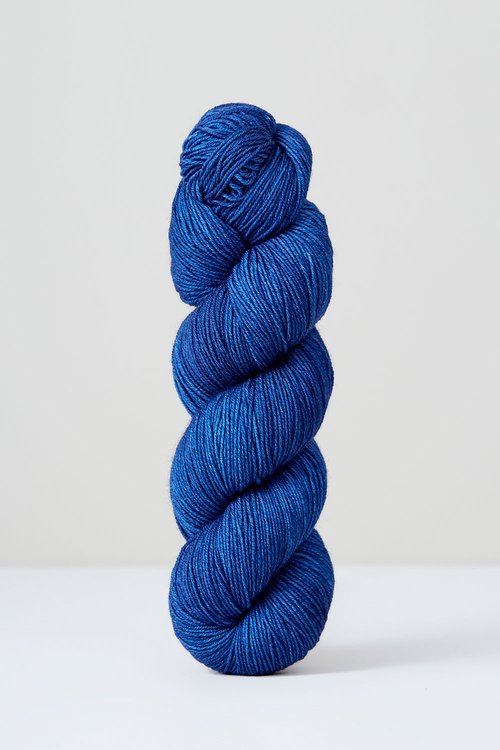 A skein of indigo superwash merino wool from Urth 